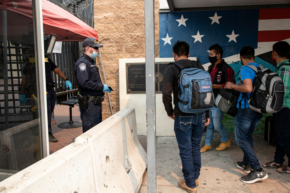 Tijuana and San Diego residents line up at the Otay gate to cross the Tijuana border line Thursday, September 10, 2020