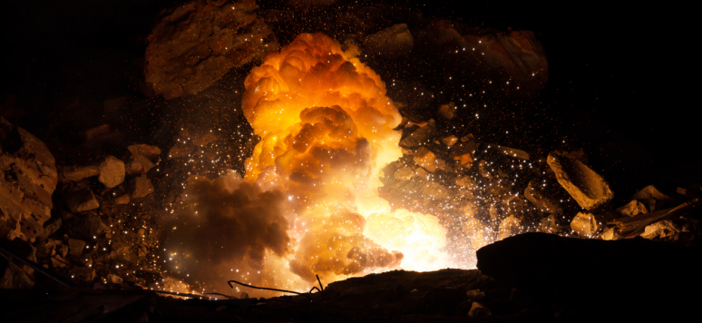 Night combat scene in a ruined city